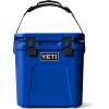 imageYETI Roadie 24 20 Hard Cooler with DoubleDuty Shoulder Strap and Drain PlugRoyal Blue